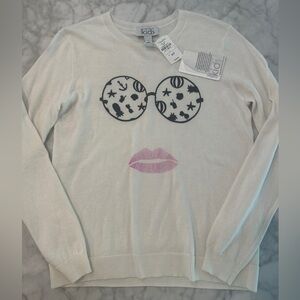 Size 14. Cashmere sweater from Neimans.